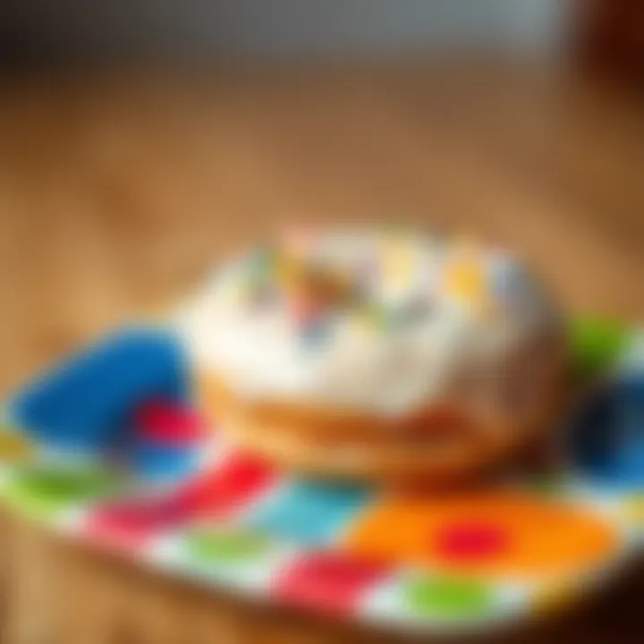 A close-up of a glazed donut with sprinkles on a colorful plate, evoking happiness and sweetness