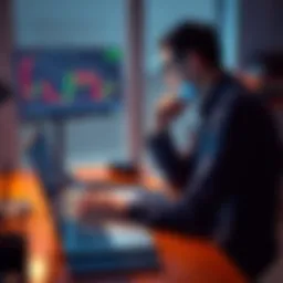 A person sits at a desk with a laptop, looking thoughtfully at trading graphs on the screen, symbolizing regret and reflection on past investments.